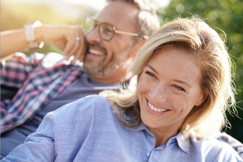 Full Arch Dental Implant Patients Smiling Together